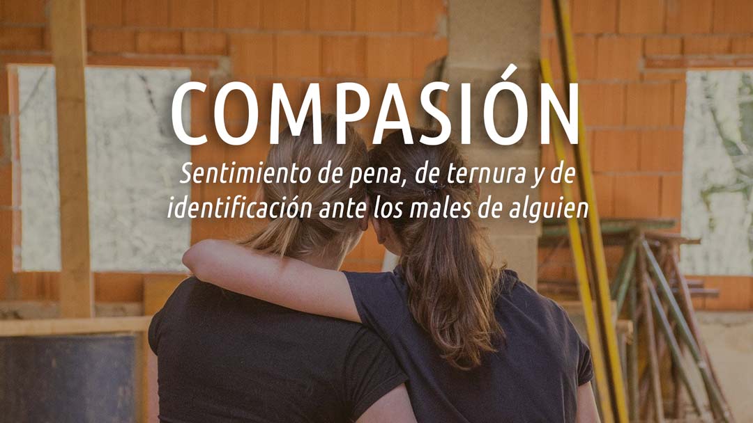 Palabras bonitas del español. Compasión. En la imagen, dos mujeres dándose un abrazo.