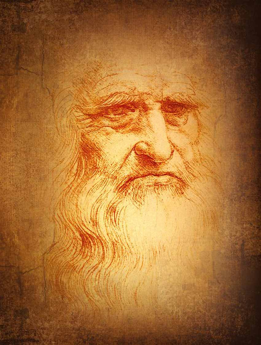 Leonardo da Vinci. Dibujo del rostro de Leonardo. Tiene apariencia de hombre de avanzada edad con larga barba.
